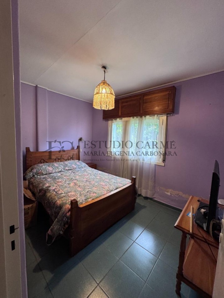 Casa centrica en lote con factibilidad para edificio Bariloche en venta